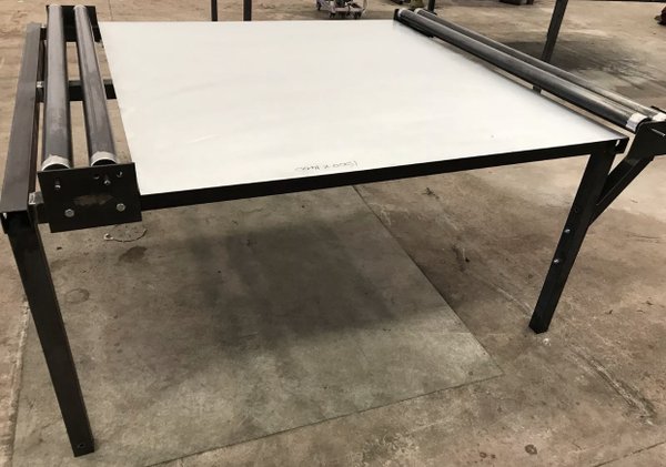 Fabric/Material work table with roller dispensers